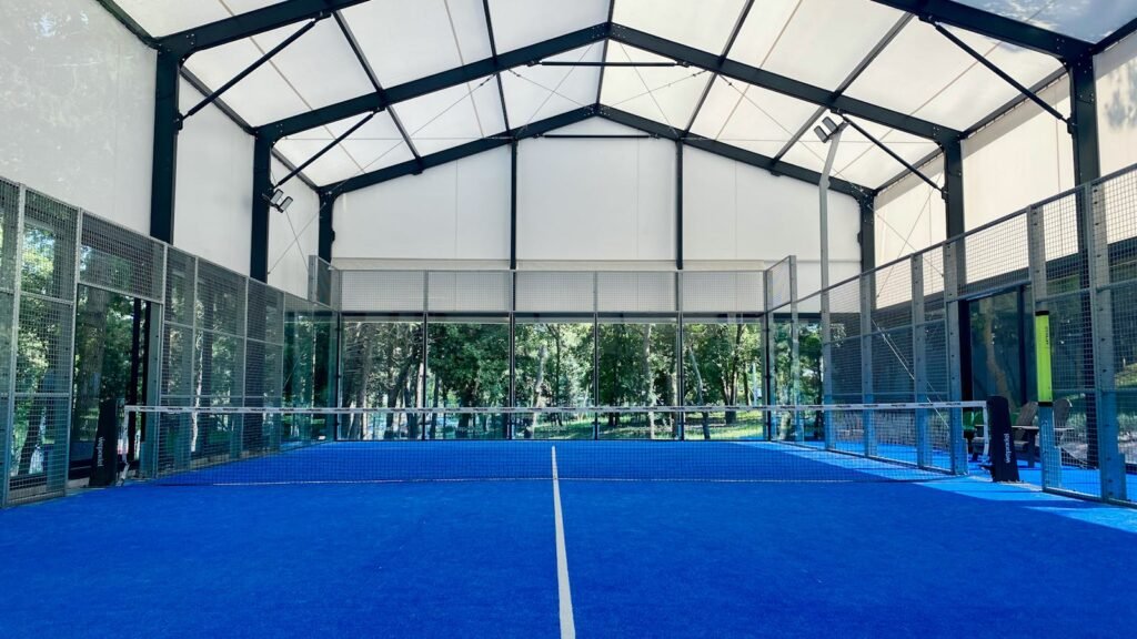 Blue padel court for an active luxury villa holiday